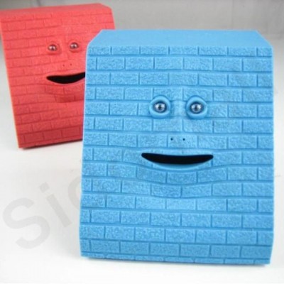 http://www.toyhope.com/84710-thickbox/creative-funny-brick-wall-face-coin-eating-piggy-bank.jpg